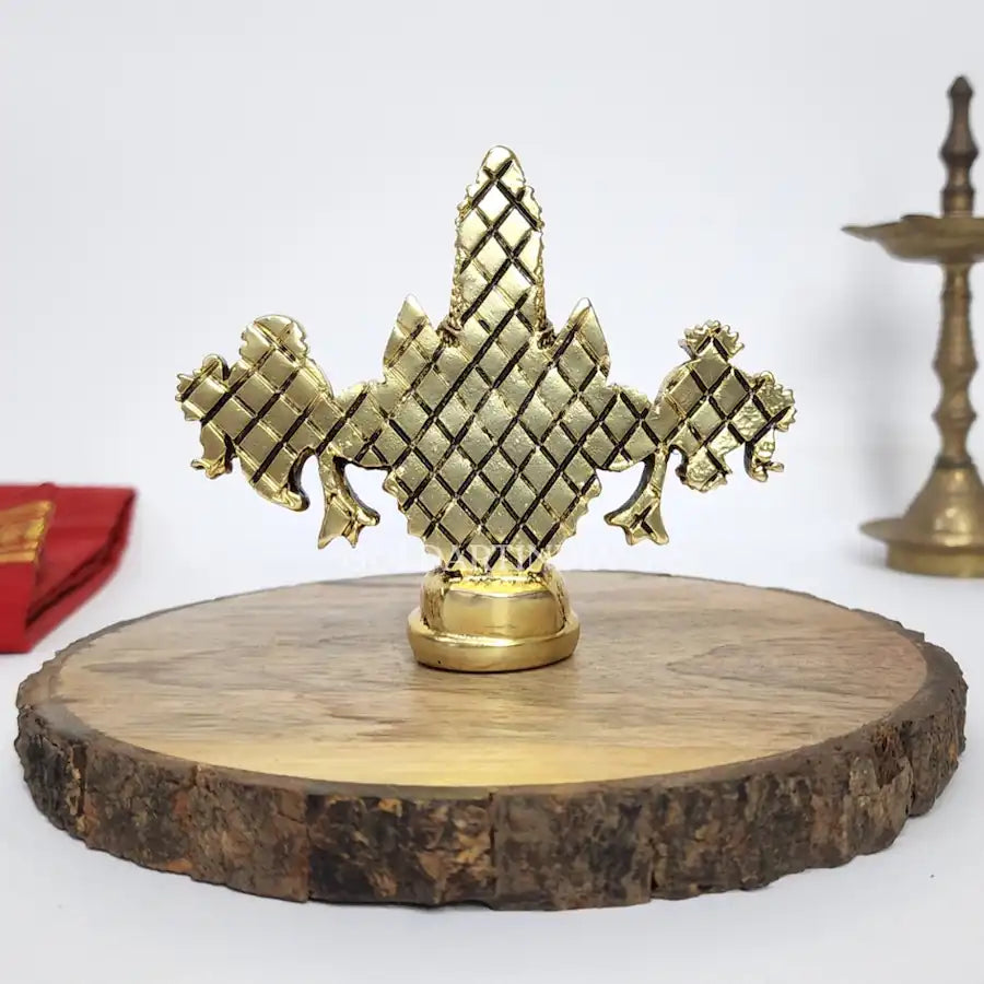 Gold-plated Lord Balaji idol back side on wooden base.