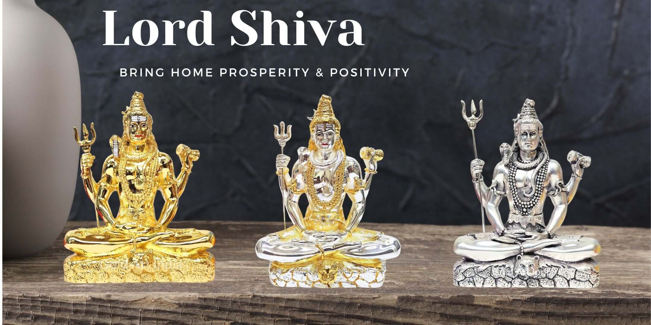 Gold and Silver Plated Lord Shiva Idols | Divine Home Decor & Gifts
A premium banner featuring three intricately designed Lord Shiva idols in gold and silver plating, placed on a wooden surface. The idols showcase Shiva in a meditative posture with a trident (Trishul) and damaru, perfect for home decor, puja rooms, and gifting.
