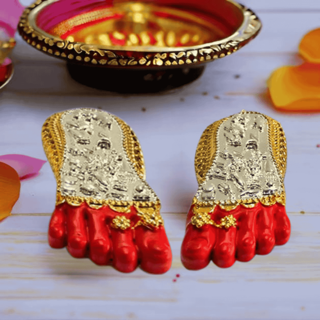 Shri Laxmi Charan Paduka in gold and silver plating with red accents, ideal for home decor and Laxmi Puja.