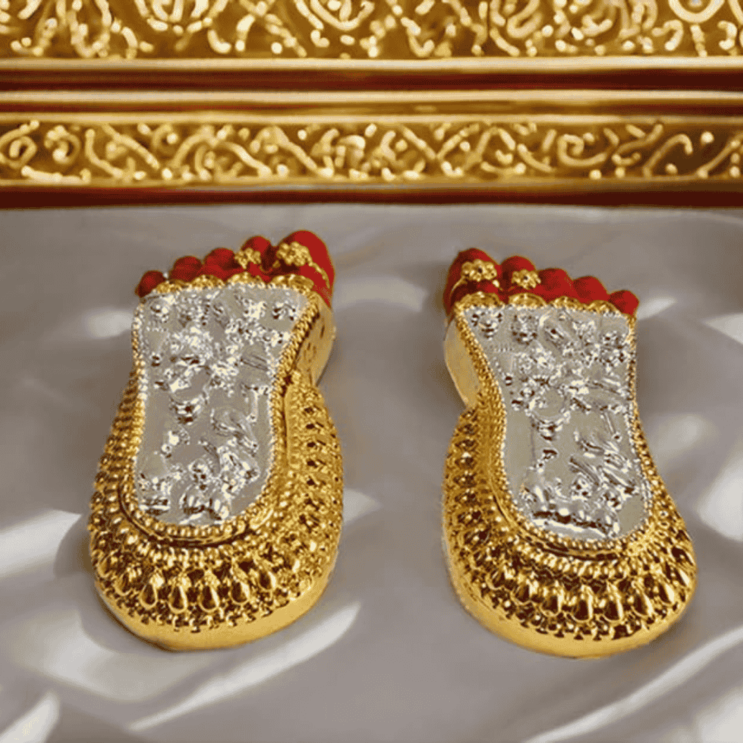Shri Laxmi Charan Paduka gold silver plated idol with red accents, symbolizing Maa Lakshmi's blessings for home decor.