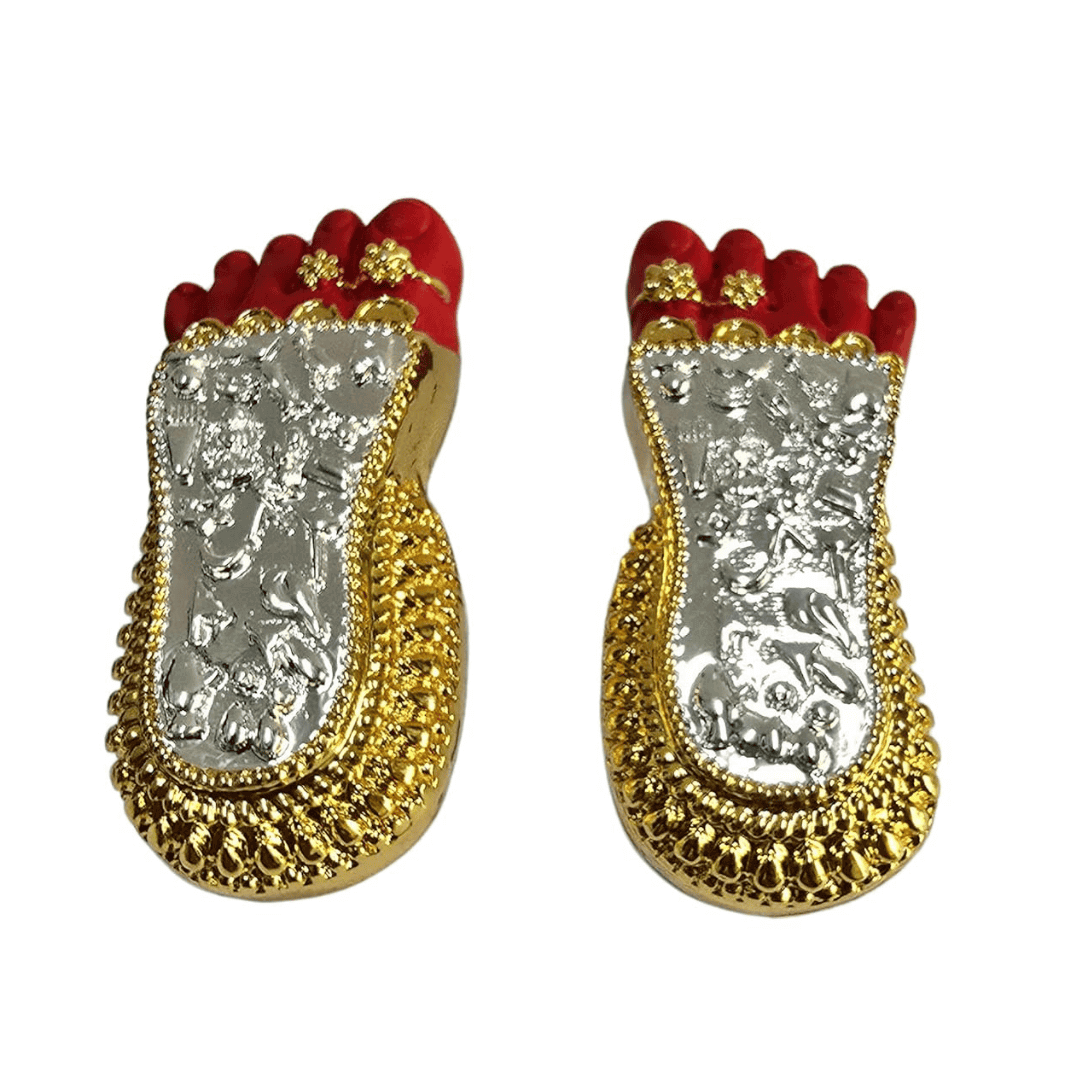 Shri Laxmi Charan Paduka gold silver plated feet idol with red accents, ideal for home temple and Laxmi Puja.