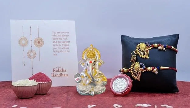 Silver matte Ganesha Rakhi combo gift set by Gold Art India with greeting card and traditional accessories