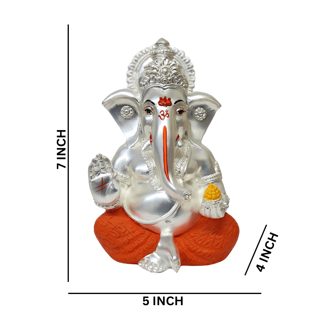 Silver Matte Mukut Ganesh Idol – 7 Inch with Orange Dhoti, perfect for decor and spiritual gifting.