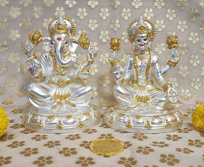 Silver plated Laxmi and Ganesha idol set with a matte finish, perfect for Diwali Puja and home decor.