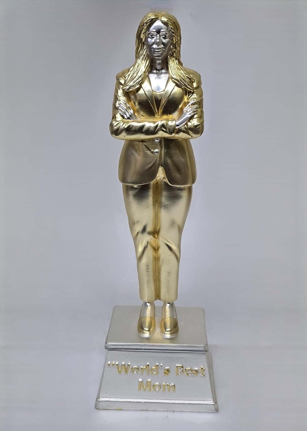 Elegant gold and silver 'World’s Best Mom' trophy featuring a confident woman in a business suit with arms crossed, symbolizing strength, leadership, and appreciation for mothers. A perfect gift for Mother's Day or special occasions.