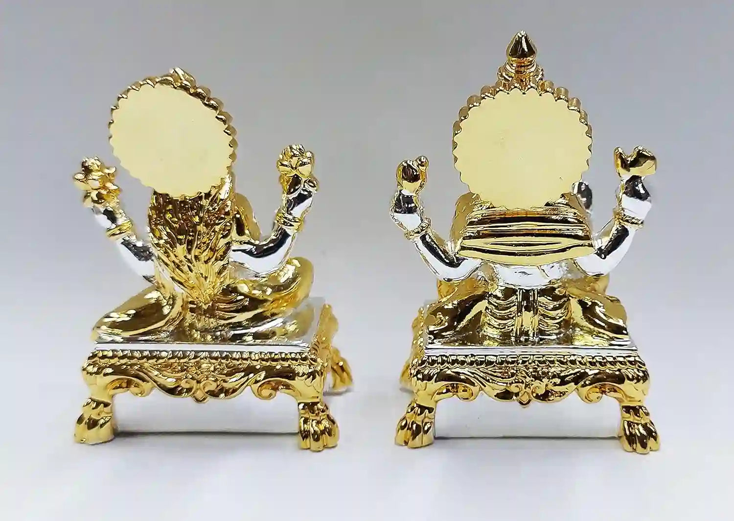 Rear view of Lakshmi and Ganesha resin idols showcasing gold and silver plated detailing with multicolour finish 