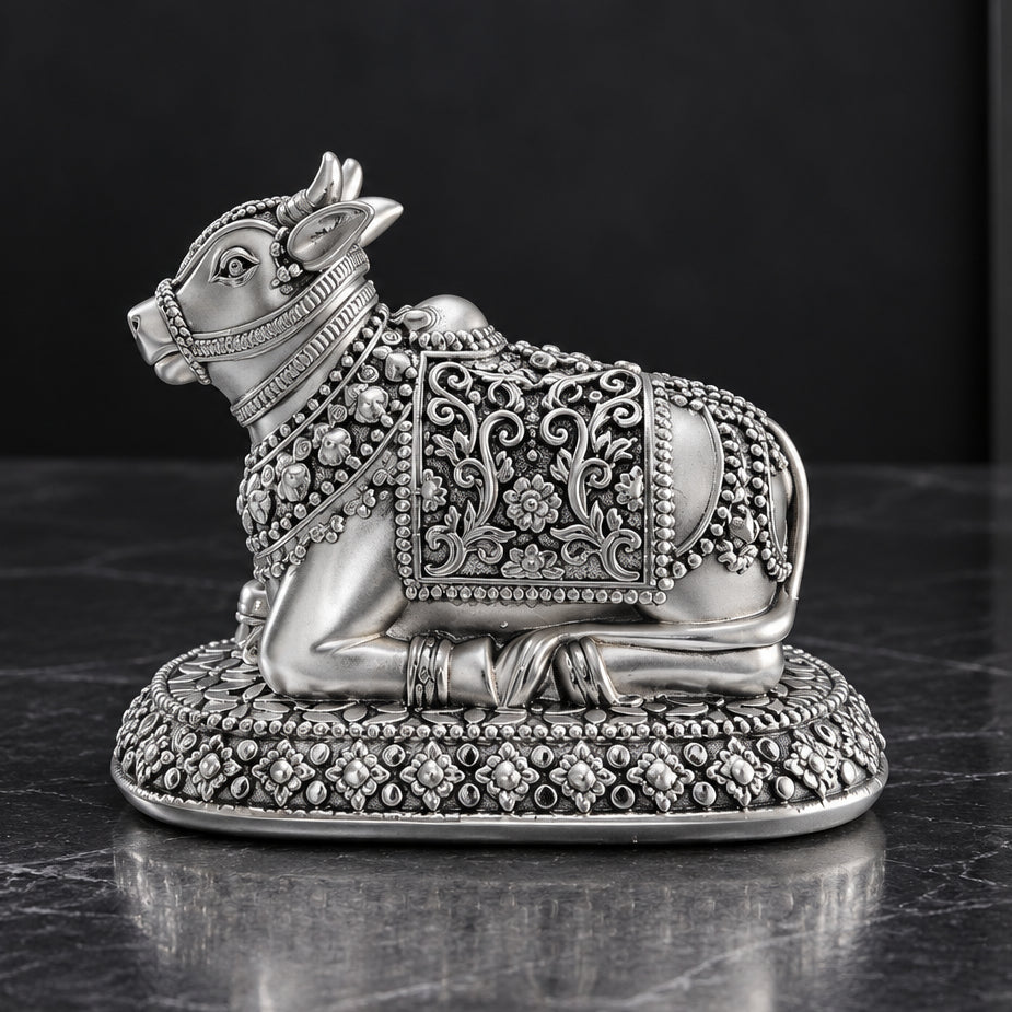 Close-up of 999 Silver Plated Nandi Ji Idol showing ornamental drape detailing