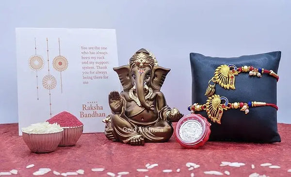 Gaddi Brown Terracotta Ganesha Idol with Rakhi Combo – Gold Art India