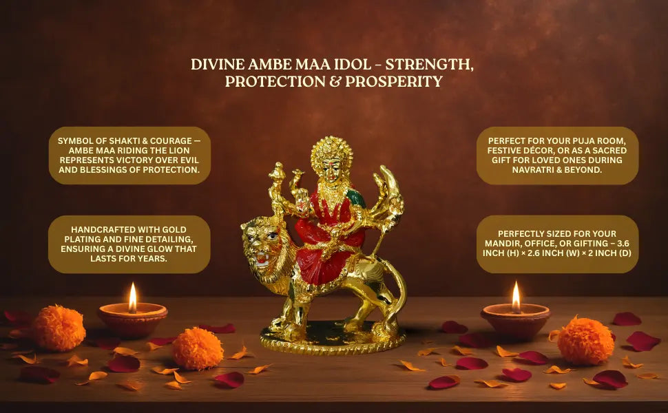 Divine Ambe Maa Idol by Gold Art India – Gold Plated with Red and Green Detailing, seated on lion symbolizing strength, protection, and prosperity. Handcrafted statue ideal for puja rooms, mandirs, festive décor, and gifting during Navratri and Diwali. Dimensions: 3.6H × 2.6W × 2D inches.
