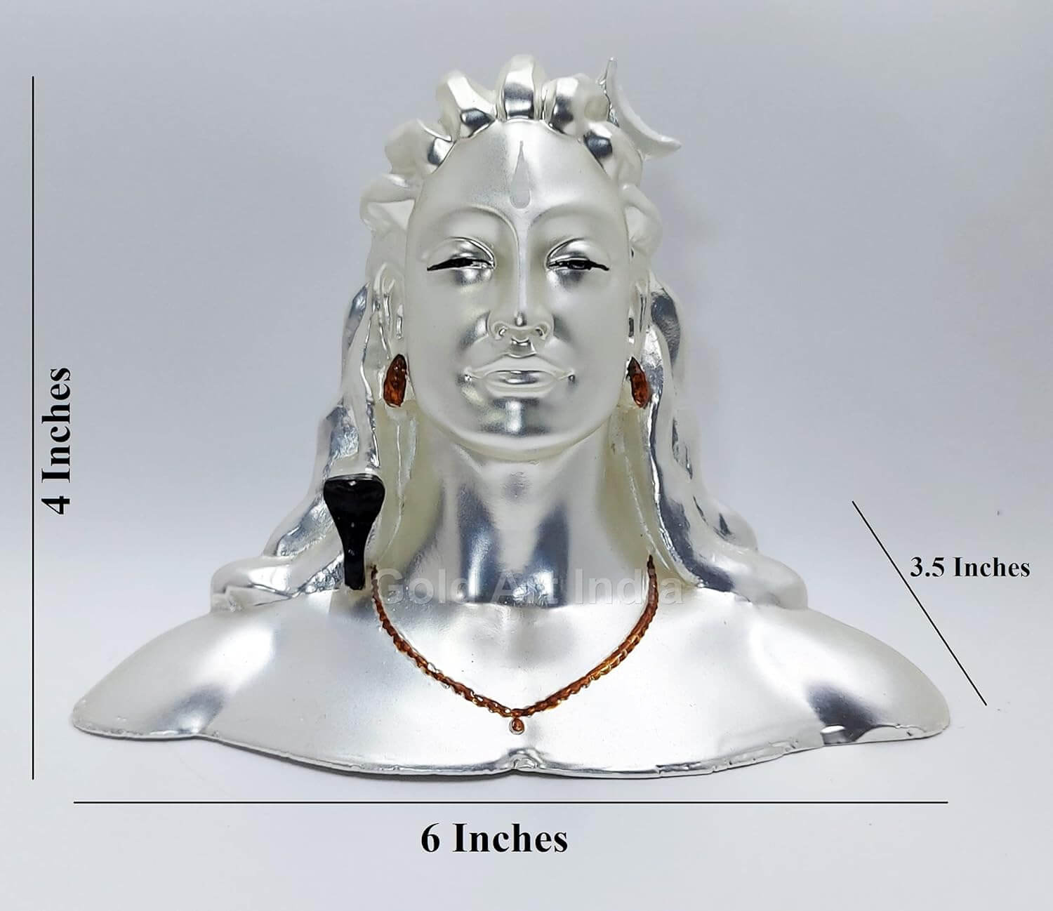 A stunning silver-plated Adiyogi bust with a sleek metallic finish, intricate facial details, and a serene expression, perfect for home or spiritual decor Dimensions 4 x 6 x 3.5 inches