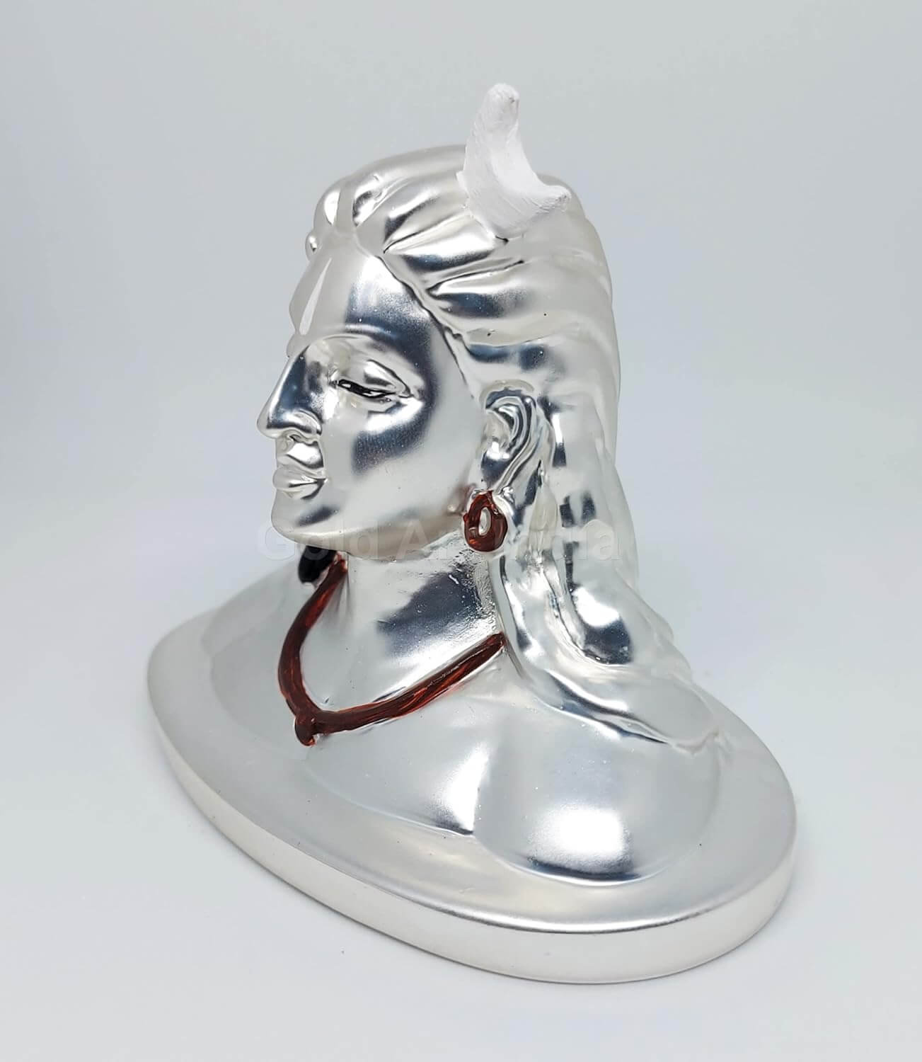 A stunning silver-plated Adiyogi bust with a sleek metallic finish, intricate facial details, and a serene expression, perfect for home or spiritual decor.