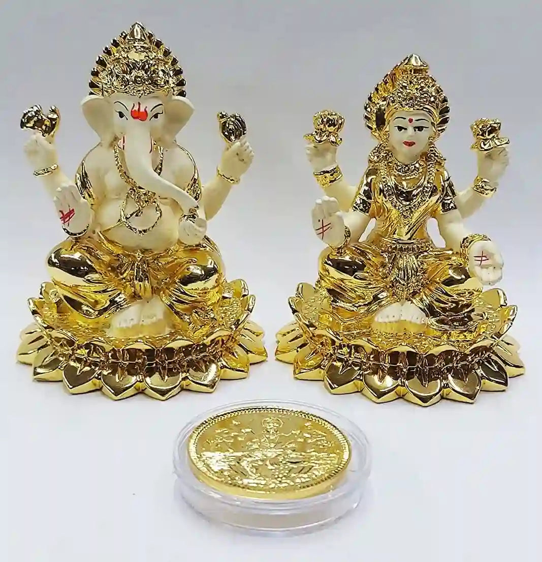 Elegant Lakshmi and Ganesh idols in gold plating with off-white terracotta base, handcrafted for puja and gifting 