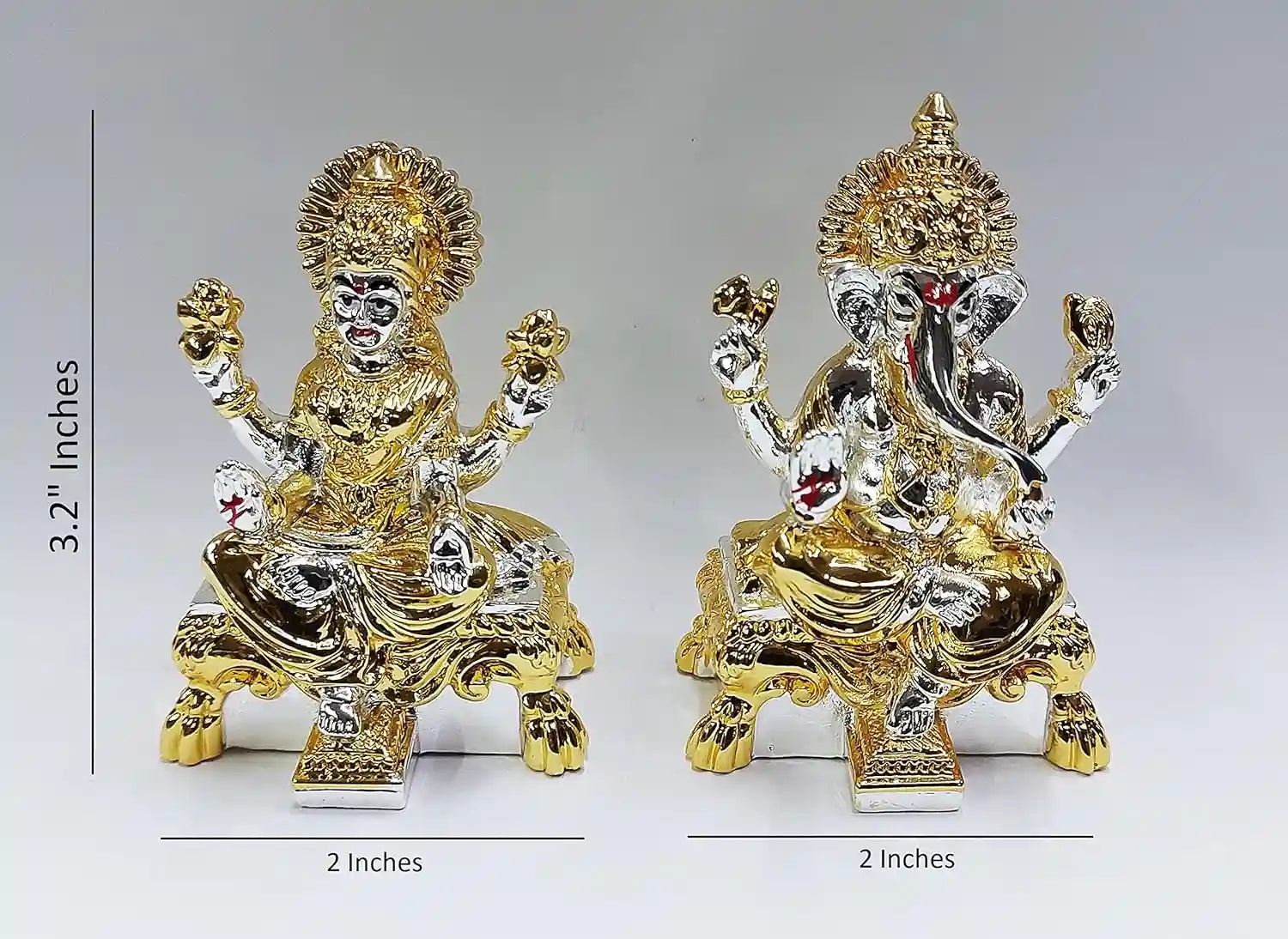 Handcrafted Lakshmi and Ganesha resin idol pair with dual-tone gold and silver plating, 3.2-inch tall, placed on decorative pedestal 
