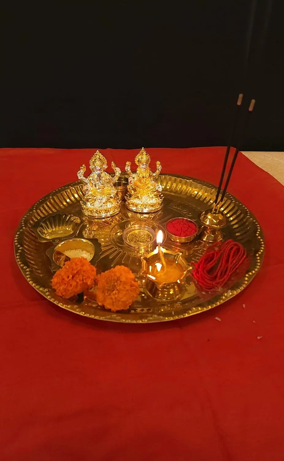 Two-Tone Lakshmi & Ganesha Idol Set with Gold-Plated Coin, festive décor setup with diyas and flowers 

