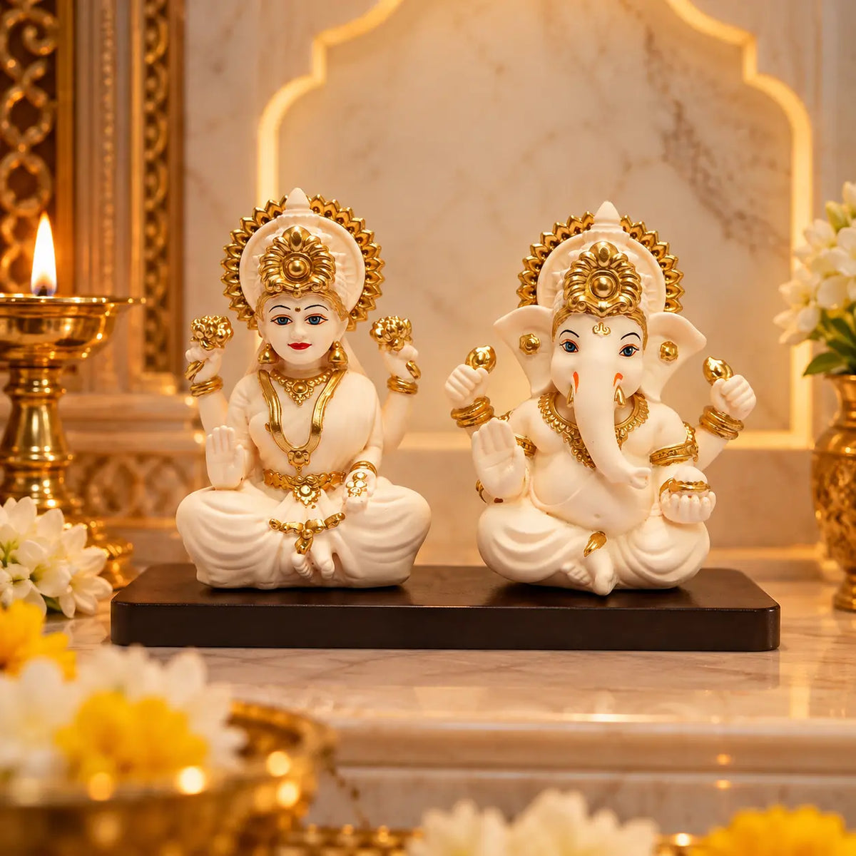 Peach ivory Lakshmi and Ganesha idol pair displayed on black MDF base with decorative elements