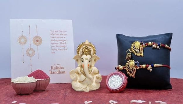 Peach Ivory Ganesha Idol with Rakhi Combo – Gold Art India