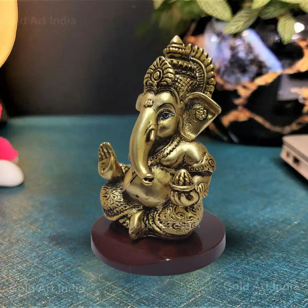 Side View of Gold Plated Mukut Ganesh Idol with Antique Finish 