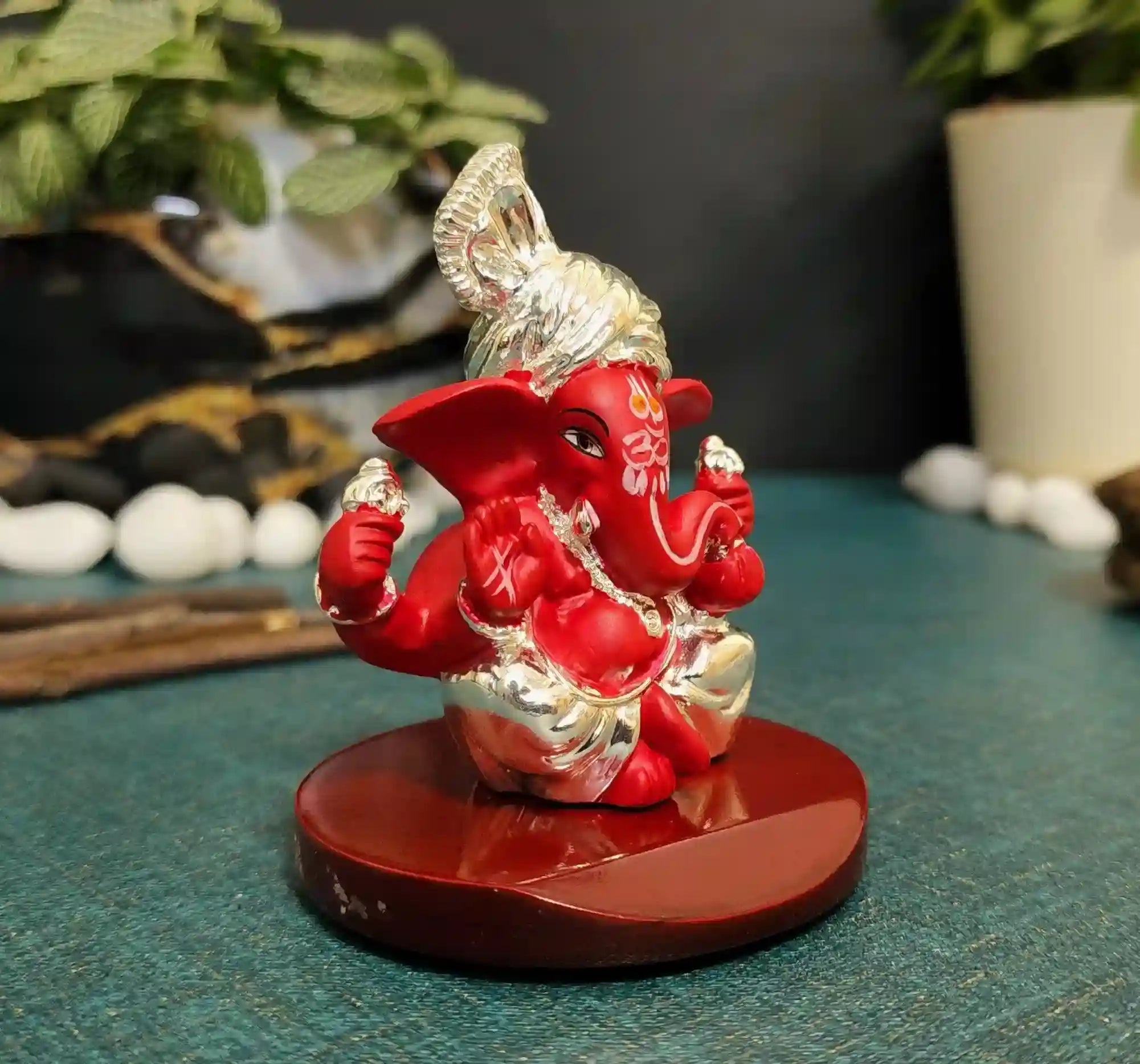 Side view of Silver & Red Pagadi Ganesha Idol – handcrafted polyresin statue with MDF base, perfect for puja and festive décor.