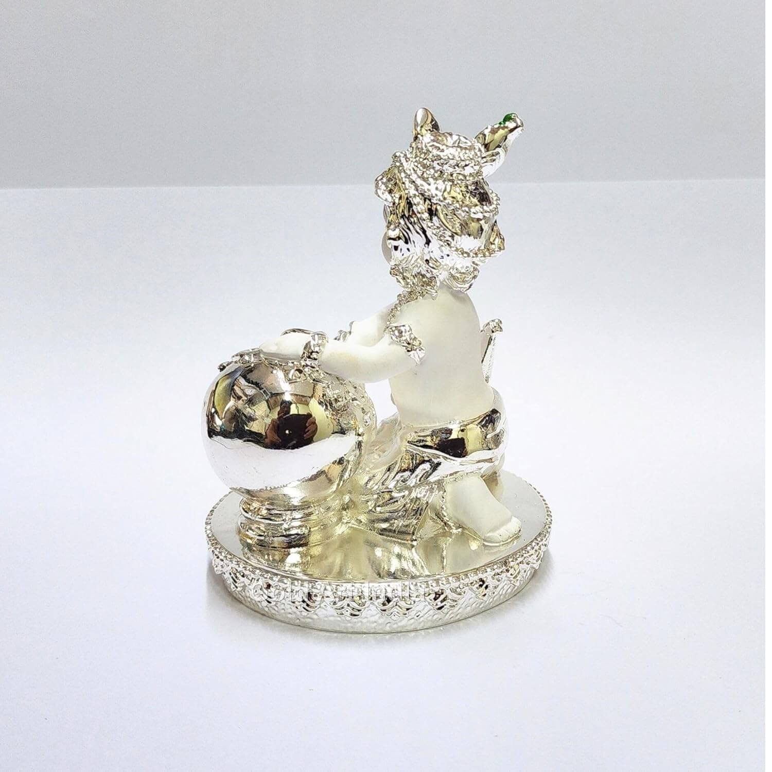 Silver plated white color makhan krishna idol sitting with a butter pot back