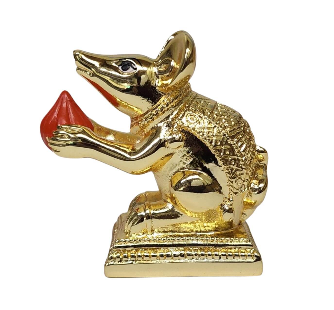 Gold-plated Mushak rat idol with intricate carvings, sitting on a decorative base, holding a Modak offering in its paws