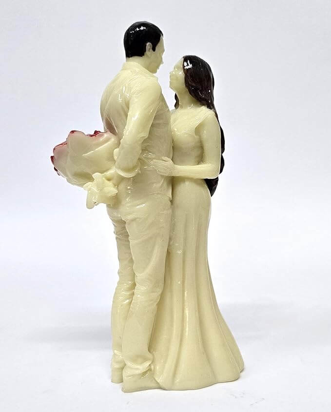 Gold Art India romantic figurine in ivory tone with red flower and black hair detail