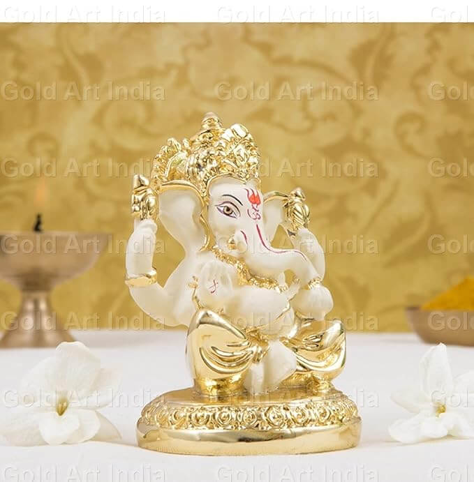 Gold plated off-white Ganesha idol, perfect for home and office décor, 3 inches tall, durable ceramic craftsmanship.