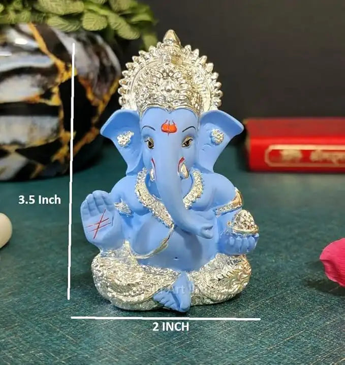 Silver plated Ganesha idol with Sky Blue terracotta finish, ideal for home and office decor, perfect gift for any occasion.
