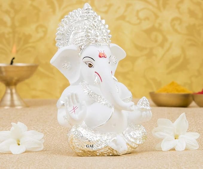 Silver plated Ganesha idol with terracotta finish, 3.5 inches tall, perfect for home and office decor.