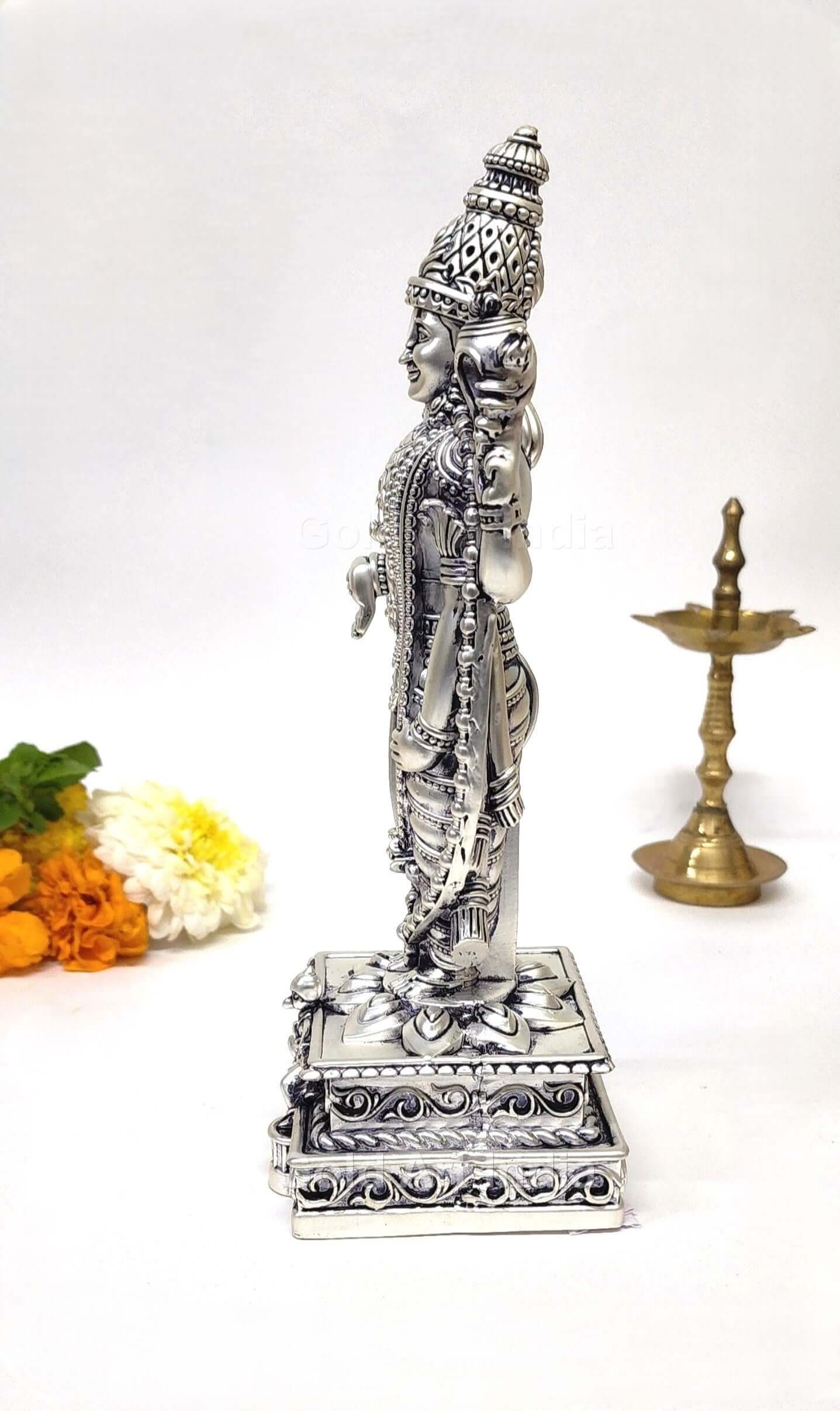 A 5.1-inch silver Plated idol of Lord Vishnu, intricately designed, standing on a decorated pedestal with divine ornaments and symbols.
