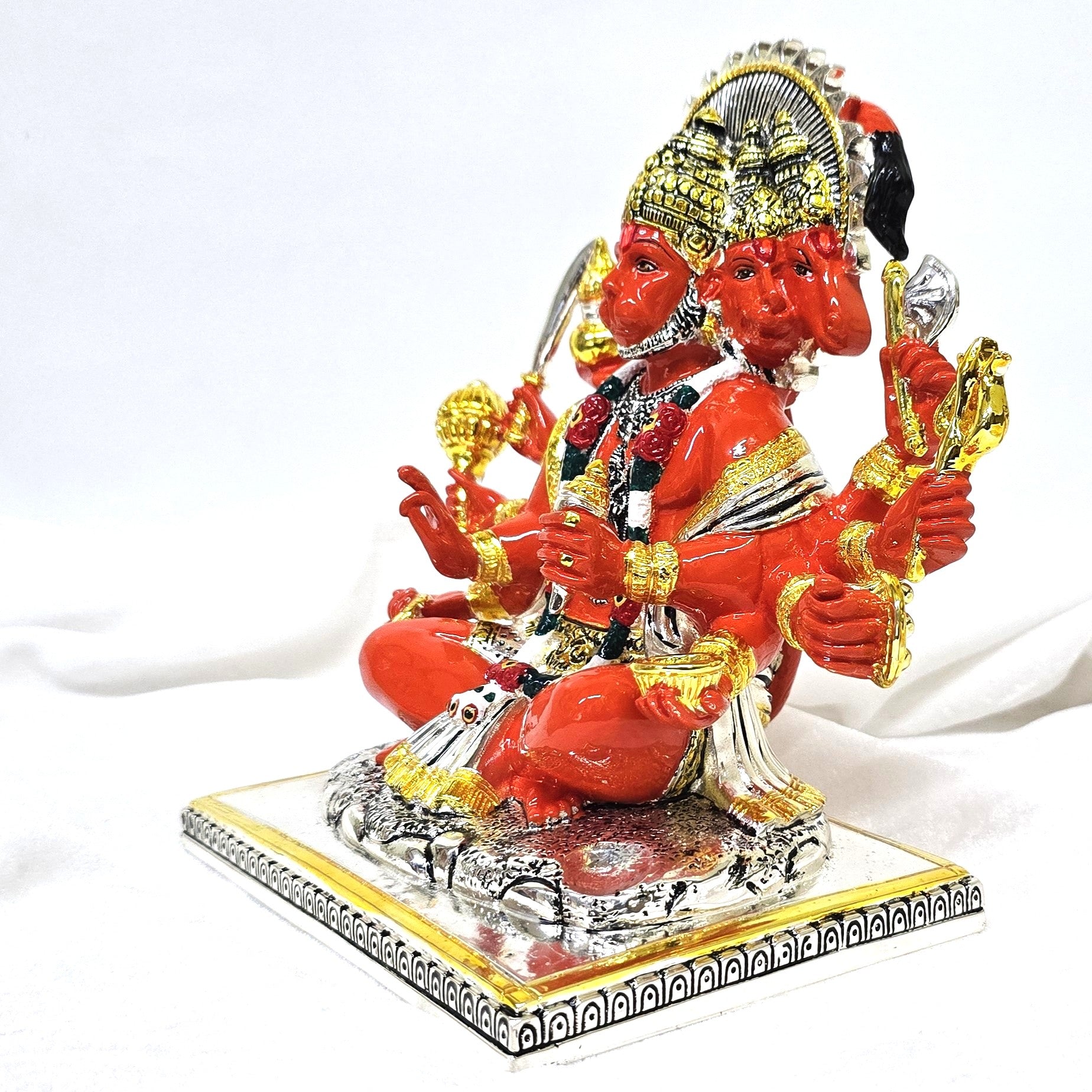 Gold and silver plated Panchmukhi Hanuman idol with five faces and ten arms, seated on decorative base – side view