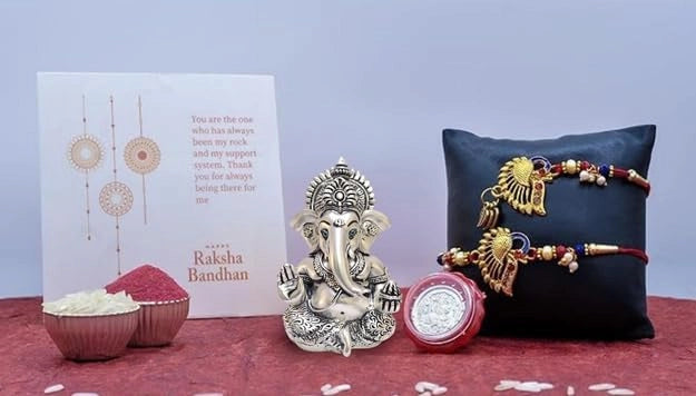 Raksha Bandhan combo with silver antique Ganesha idol, rakhi, lumba, coin, and card – Gold Art India
