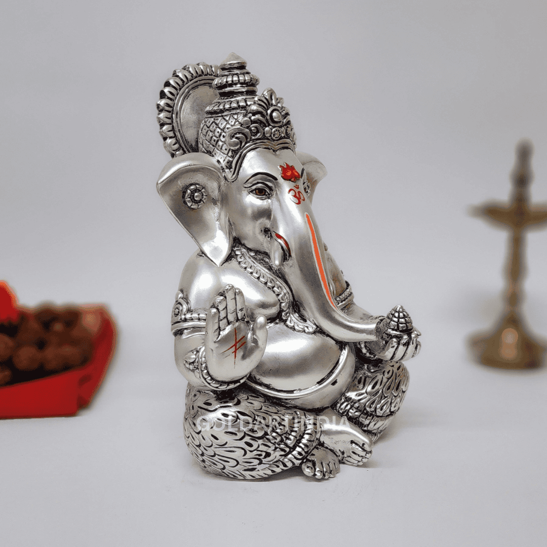 Silver Antique Mukut Ganesh Idol with intricate detailing, perfect for pooja and home decor.
